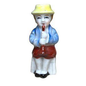 Vintage 1950's Ceramic Figurine Seated Boy with Yellow Hat Playing Horn Occupied